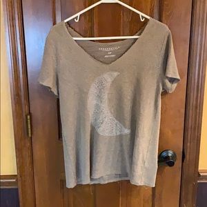 Worn V-neck shirt with moon tribal print!